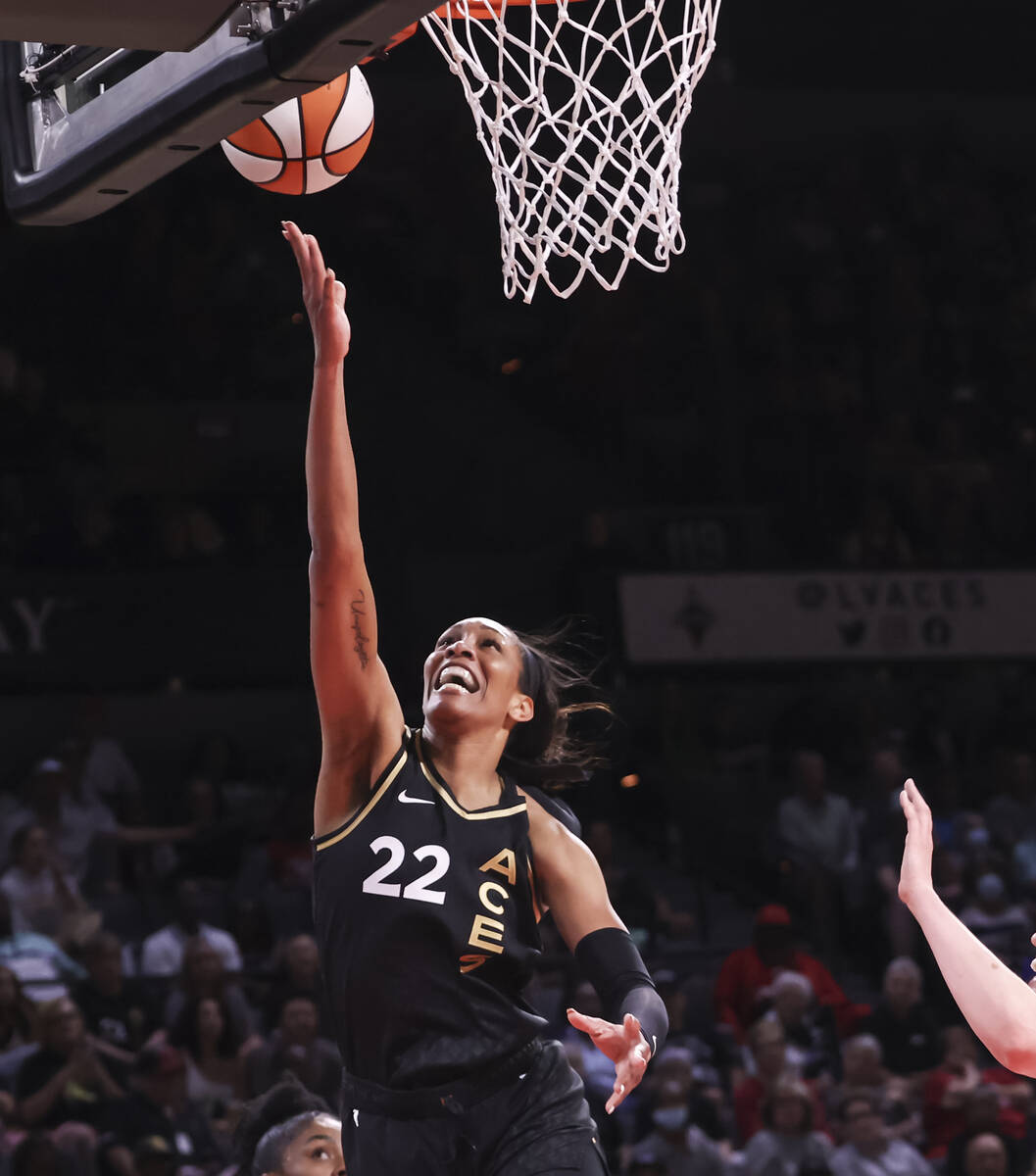 Las Vegas Aces forward A'ja Wilson (22) lays up the ball against the Minnesota Lynx during the ...