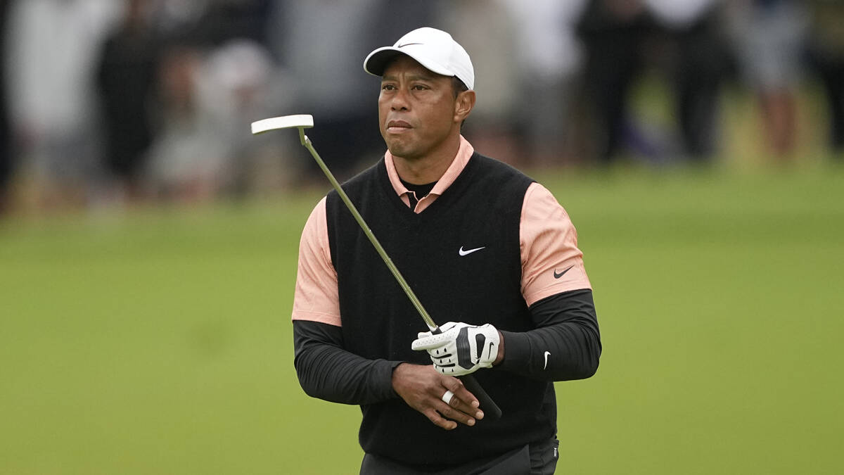 Tiger Woods plays during the third round of the PGA Championship golf tournament at Southern Hi ...