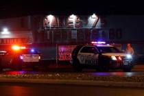 Police investigate a fatal crash in the 3100 block of Las Vegas Boulevard North near North Peco ...