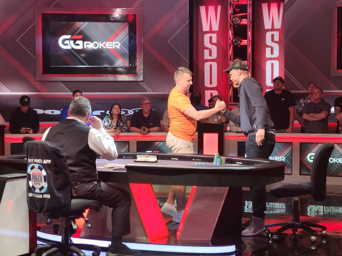 Phil Ivey, right, congratulates Latvia's Aleksejs Ponakovs after his victory in the World Serie ...
