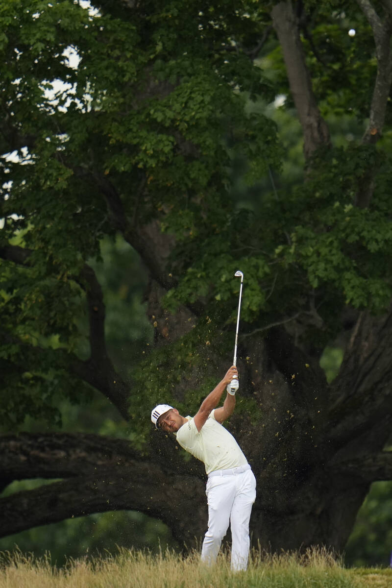 Xander Schauffele hits on the sixth hole during the second round of the U.S. Open golf tourname ...