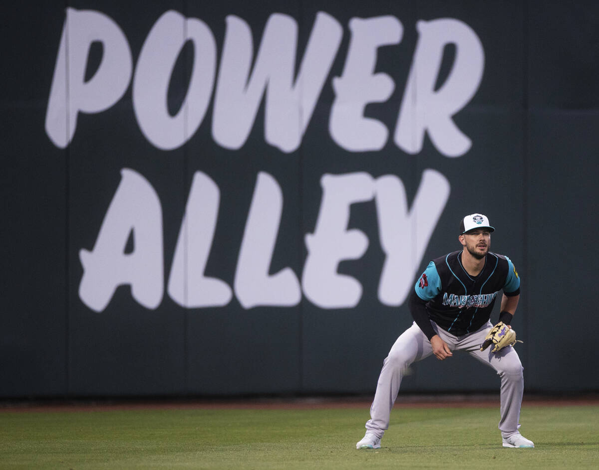 Colorado Rockies third baseman Kris Bryant plays left field during a rehab assignment with the ...
