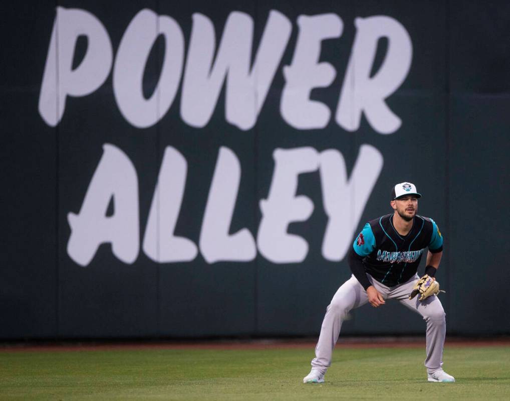 Colorado Rockies third baseman Kris Bryant plays left field during a rehab assignment with the ...