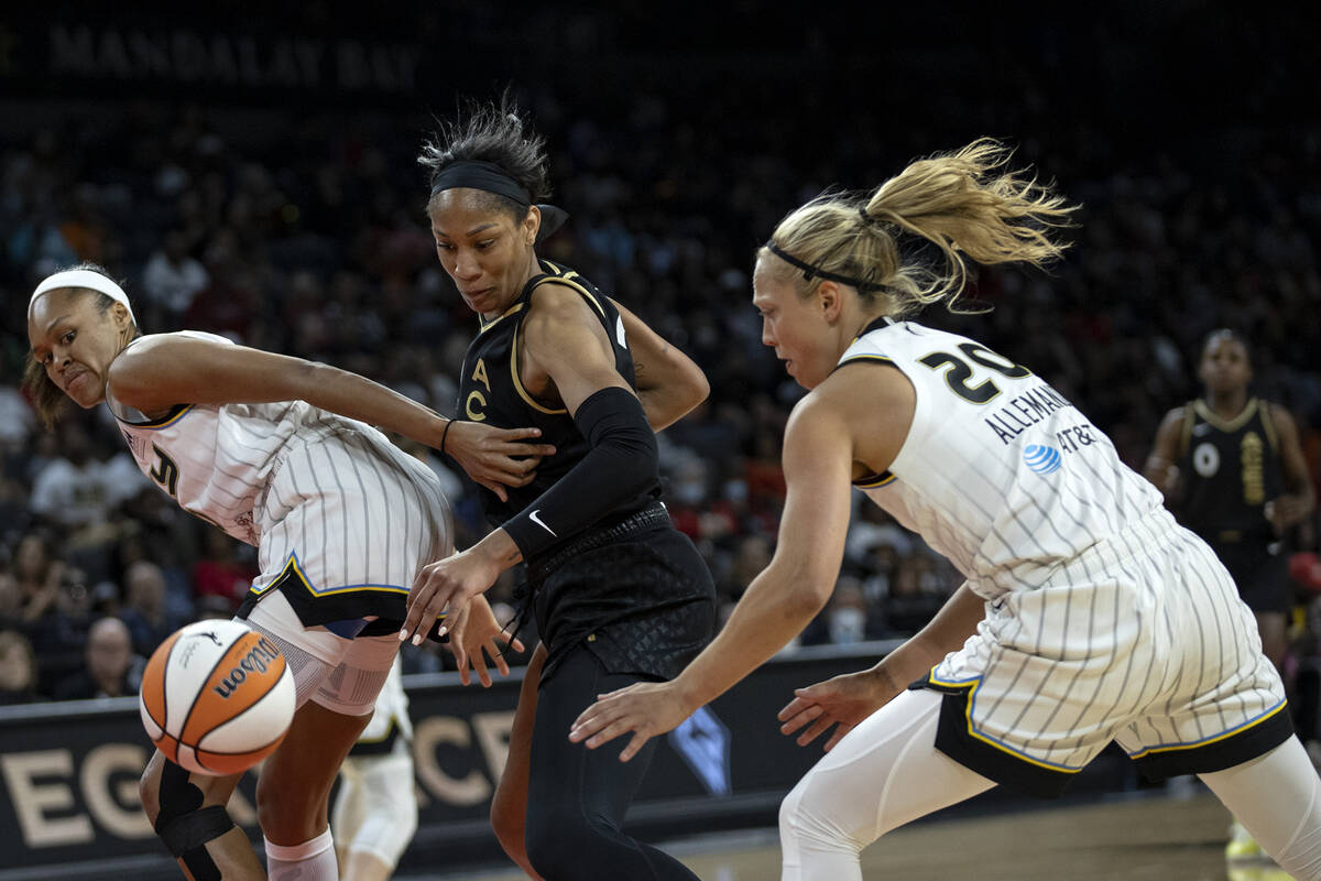 Las Vegas Aces forward A'ja Wilson (22) attempts to block Chicago Sky guard Julie Allemand (20) ...