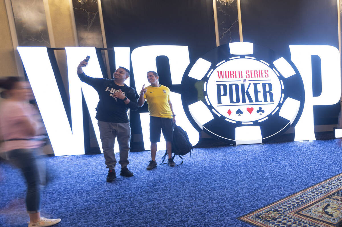 In this June 4, 2022, file photo, people attend the World Series of Poker "Housewarming" event ...