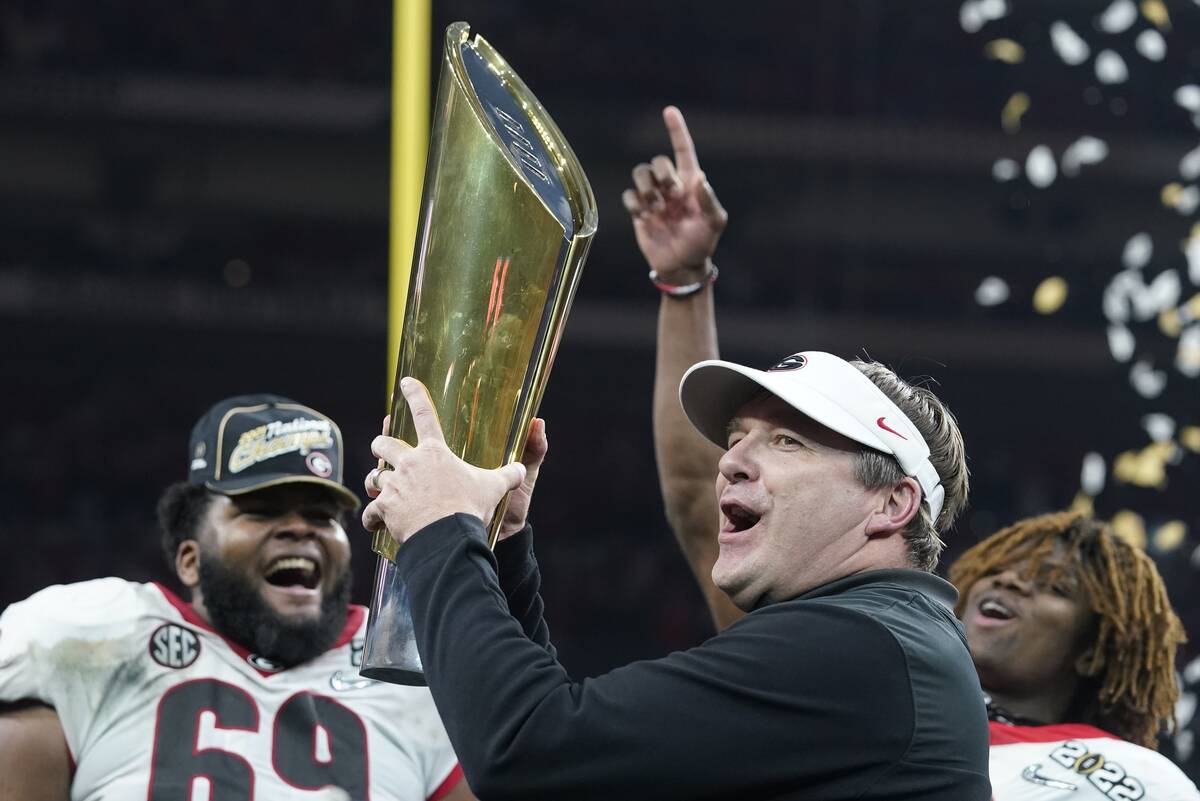 Georgia head coach Kirby Smart celebrates after the College Football Playoff championship footb ...