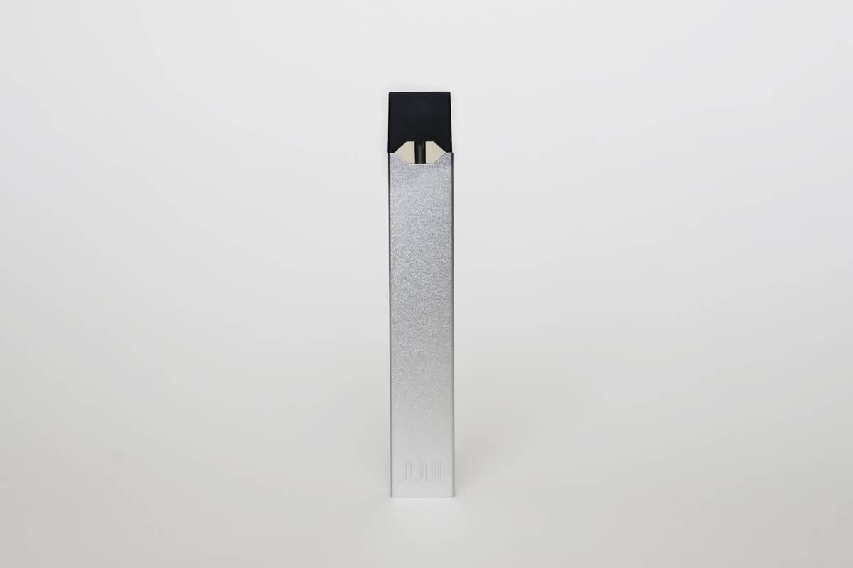 FILE - An electronic cigarette from Juul Labs is seen on Tuesday, Feb. 25, 2020, in Pembroke Pi ...