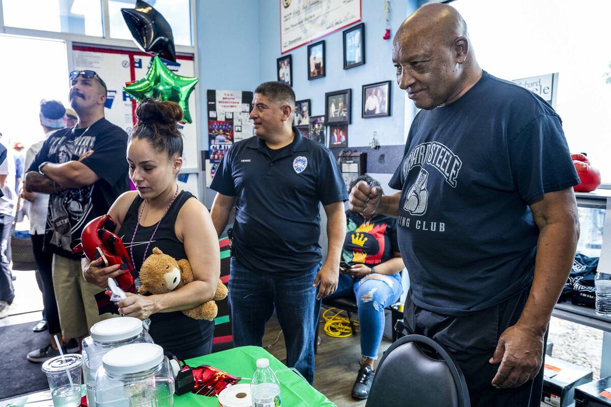 (From right) Legendary boxing referee Richard Steele poses for a picture near North Las Vegas P ...