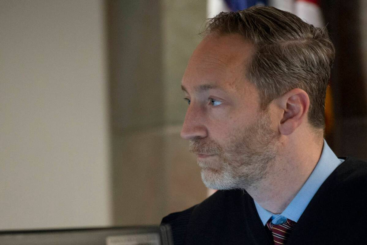 Daniel Westmeyer presides over the initial hearing for Michael Dion Earl, who is suspected of s ...