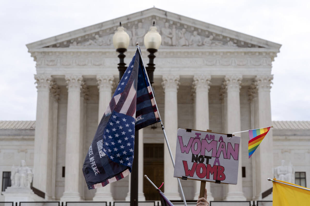 Abortion-rights activists protest outside of the U.S. Supreme Court on Capitol Hill in Washingt ...