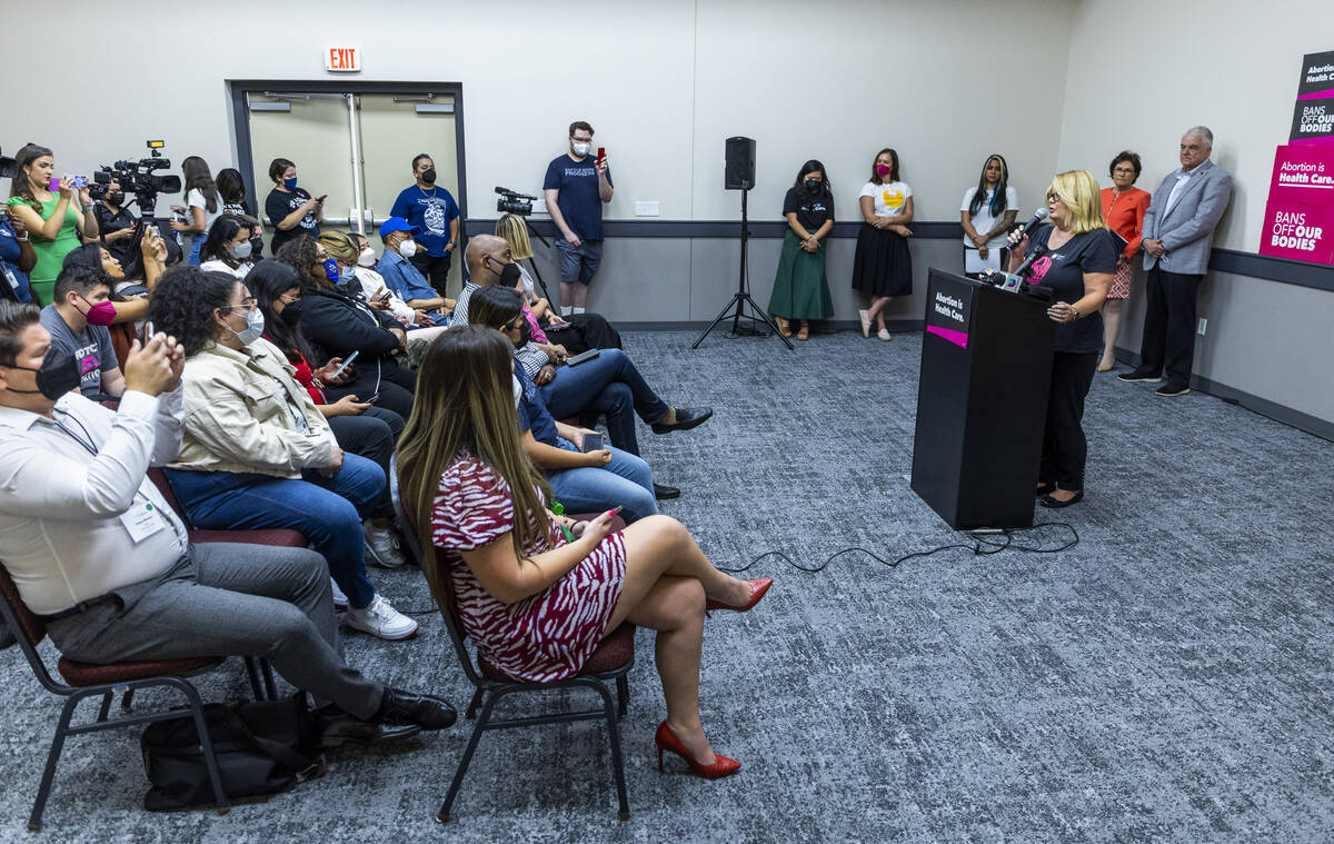 Jeri Burton with Nevada NOW, right, speaks during an emergency press conference regarding the S ...