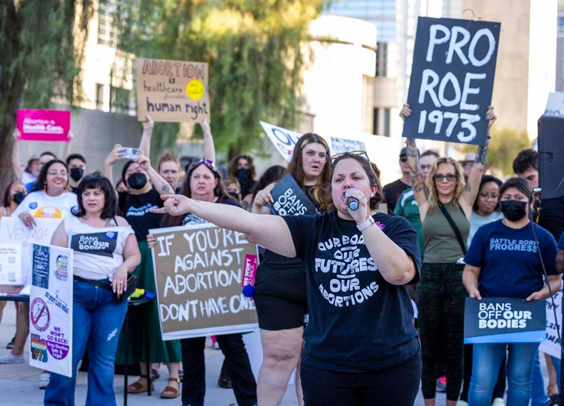 Annette Magnus with the Battleborn Progress pumps up the crowds while speaking in response to R ...