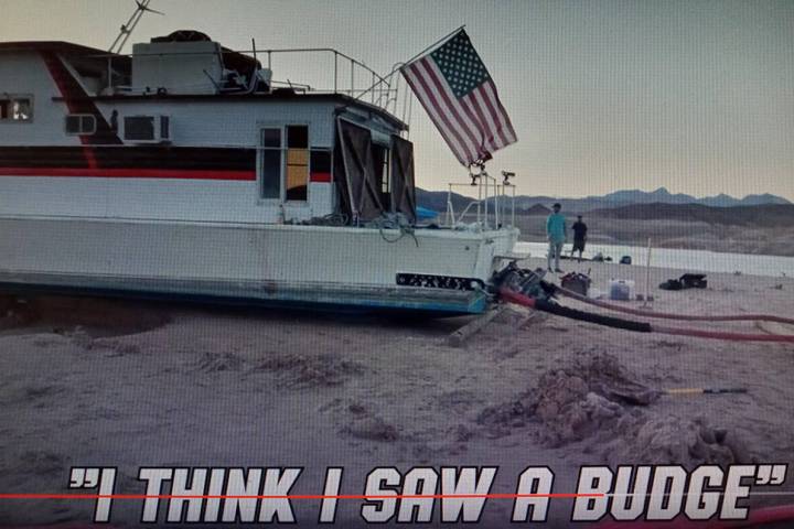 The houseboat/residence of Craig Miller before it was pulled off the sand at Lake Mead on Thurs ...