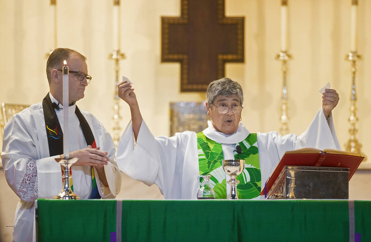 Rev. Liz Zivanov, right, preaches to the congregation at Christ Church Episcopal on Sunday, Jun ...