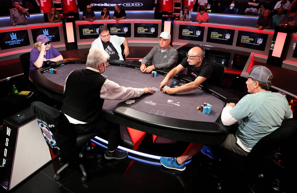 Biagio Morciano, second from right, goes all in at the final table of the World Series of Poker ...