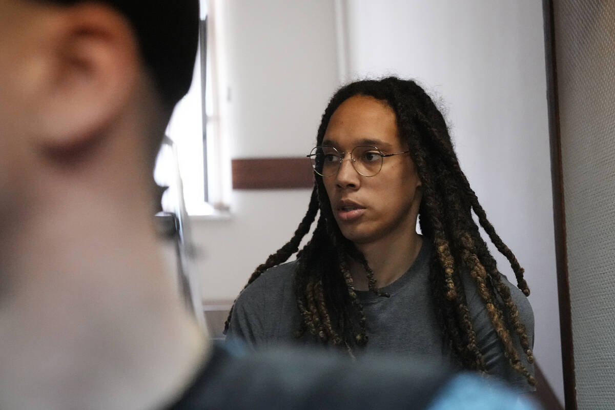 WNBA star and two-time Olympic gold medalist Brittney Griner is escorted to a courtroom for a h ...
