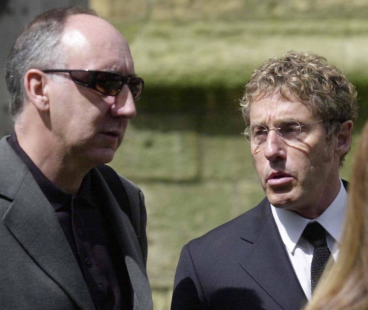 The Who guitarist Pete Townshend, left, and singer Roger Daltry leave the funeral of the group' ...