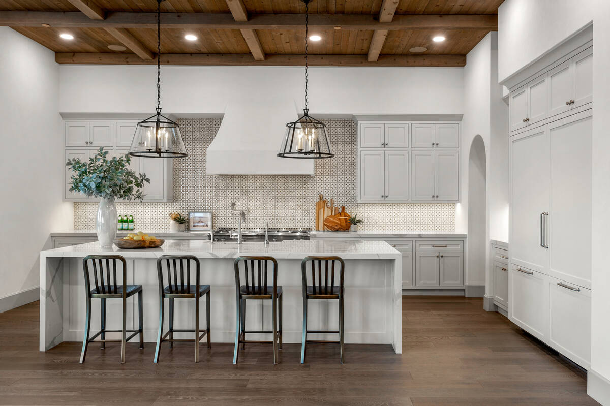 A luxury house in The Summit Club, a wealthy enclave in Las Vegas' Summerlin community, sold fo ...