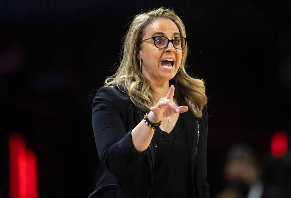 Aces head coach Becky Hammon directs her team in the second half during a WNBA basketball game ...