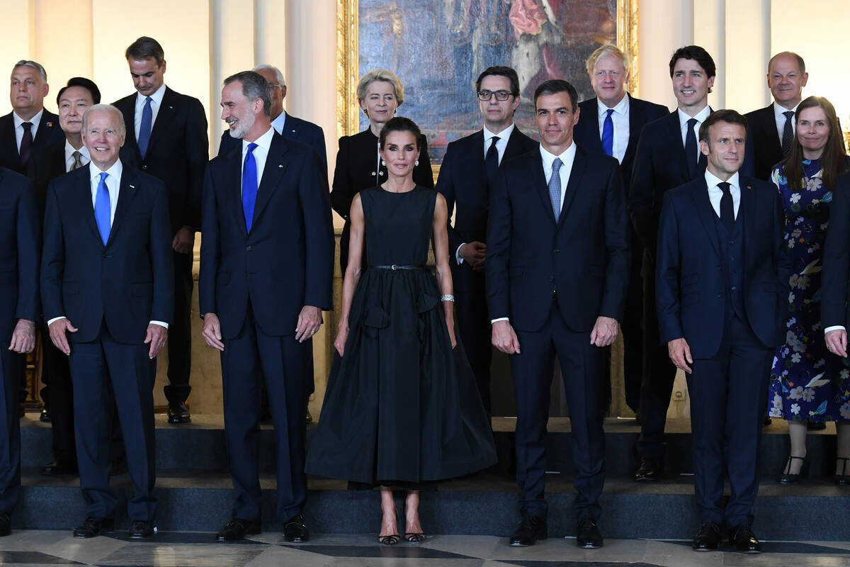 First row, U.S President Joe Biden, left, Spain's Prime Minister Pedro Sanchez, second right, F ...