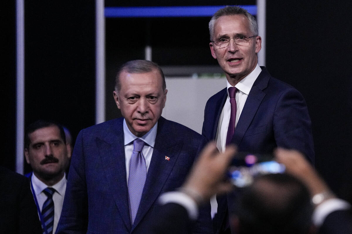 Turkish President Recep Tayyip Erdogan, second left, and NATO Secretary General Jens Stoltenber ...