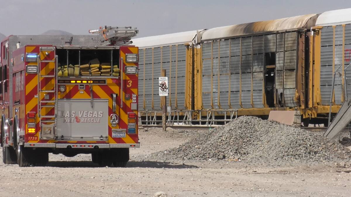Las Vegas firefighter vehicle next to a train that caught fire near Main Streets and Bonanza Ro ...