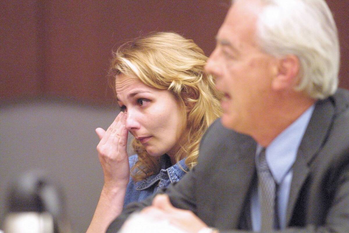 Sandy Shaw listens to her attorney William Terry talk to the Nevada Board of Pardons in June 20 ...