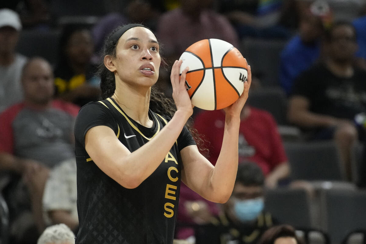 Las Vegas Aces' Dearica Hamby (5) plays against the Dallas Wings in an WNBA basketball game Sun ...