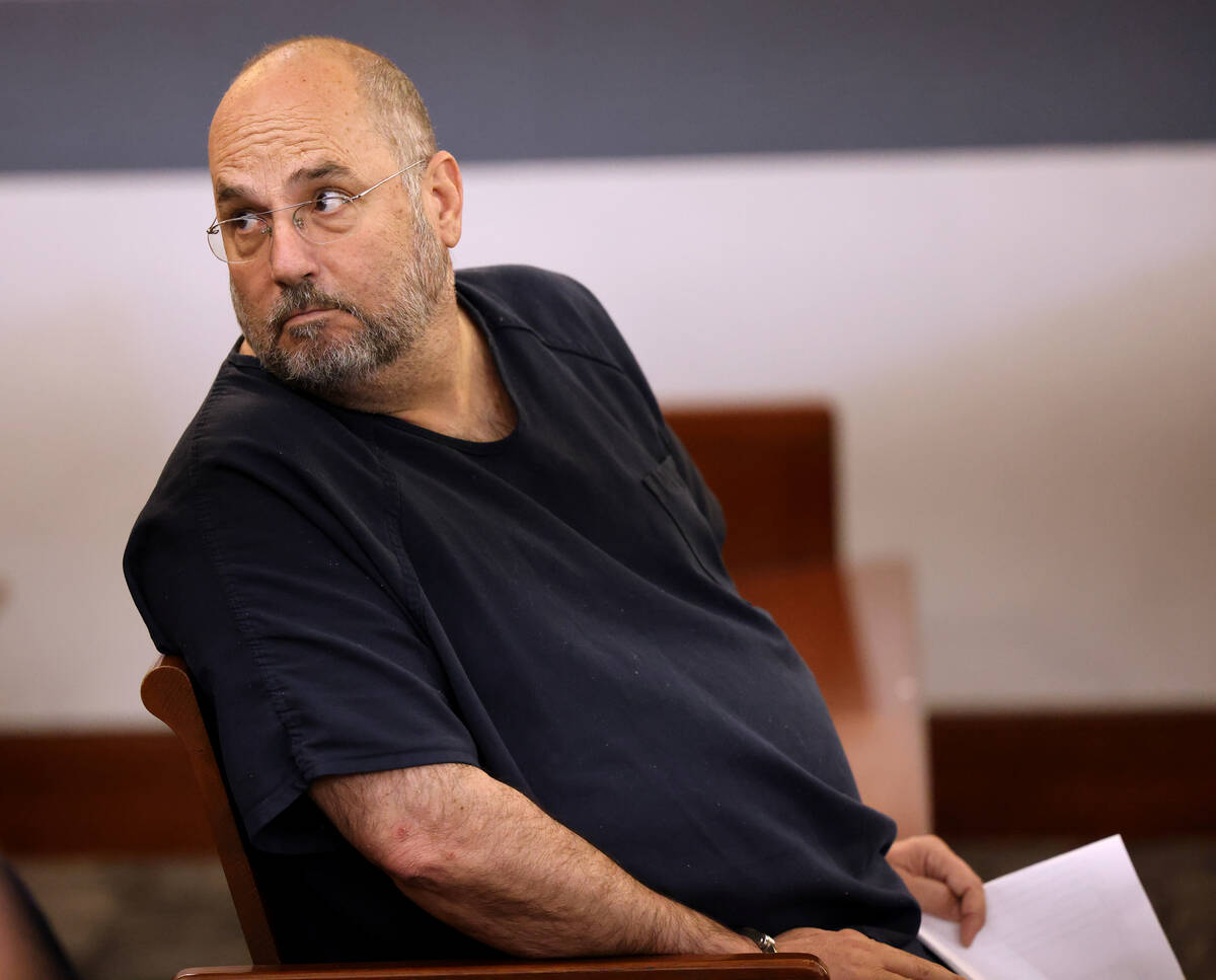 Attorney Douglas Crawford, 67, waits to make his initial appearance in Las Vegas Justice Court ...