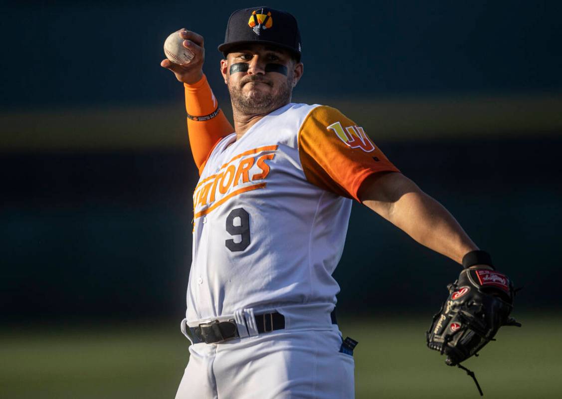 Aviators infielder Vimael Machin (9) warms up before the start of a minor league baseball game ...