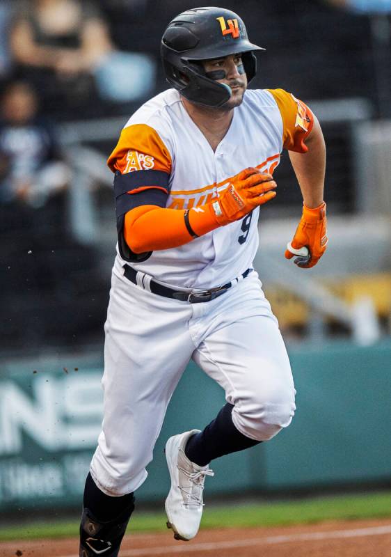 Aviators infielder Vimael Machin (9) runs down the line during a minor league baseball game aga ...
