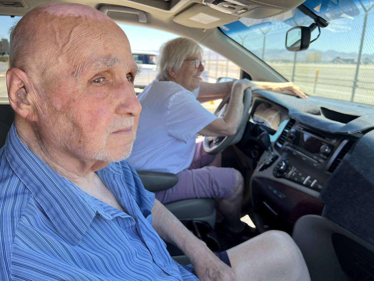 Jim and Sandy Anelle of Las Vegas check out planes at the Harry Reid International Airport view ...