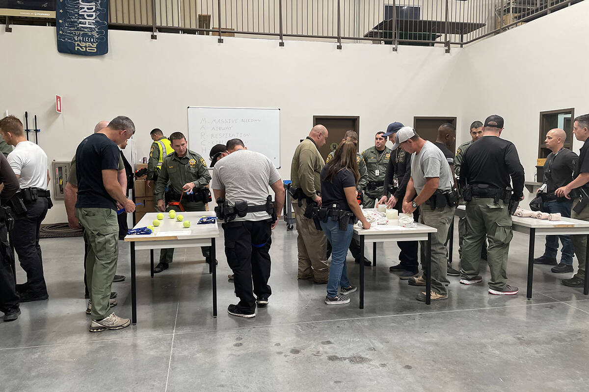 Students of the Metropolitan Police Department academy learn life-saving techniques Thursday, J ...