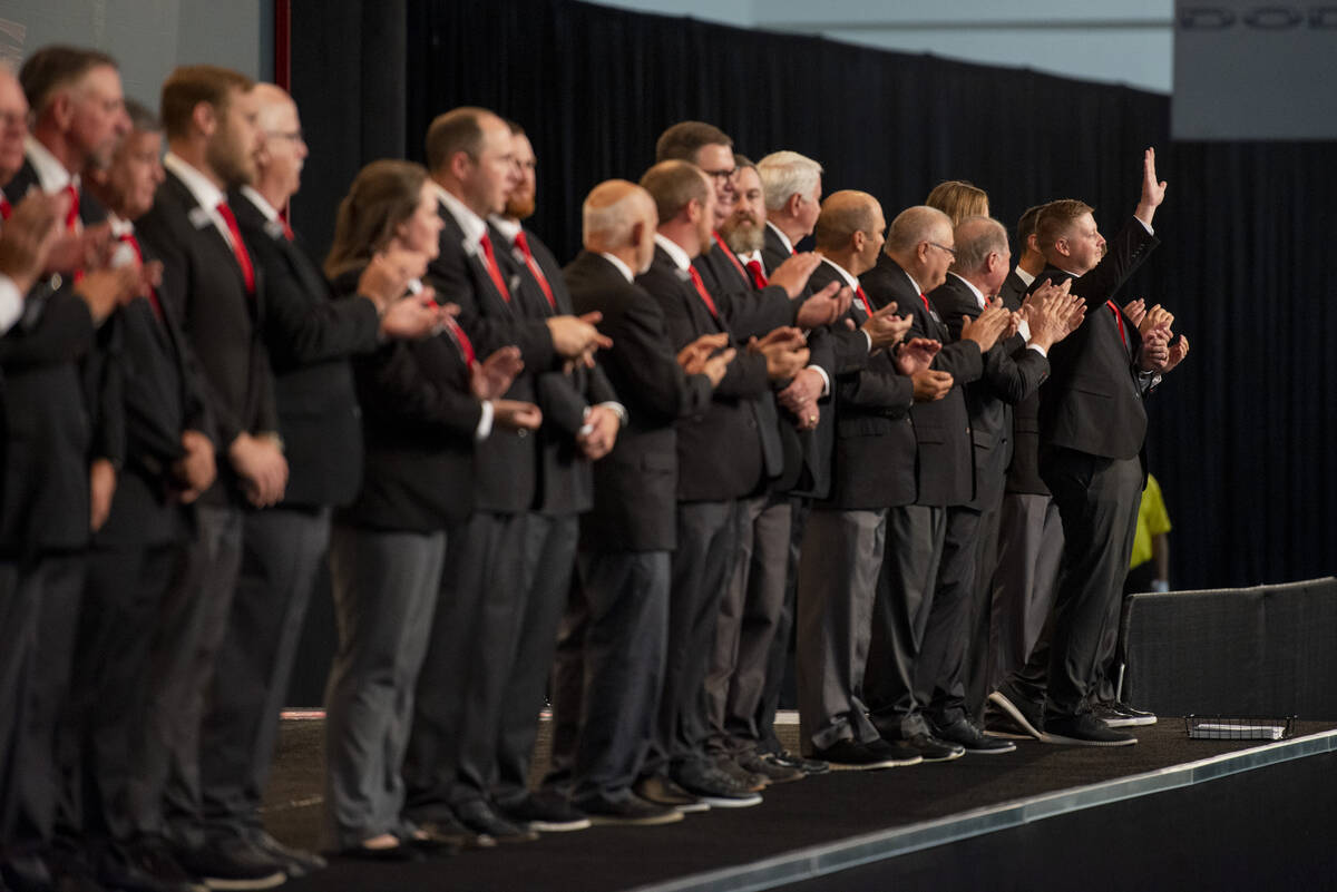 Auction staff is introduced during the opening day of the Barrett-Jackson car auction at the La ...