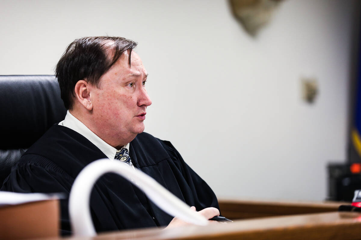 District Judge Robert Lane delivers a sentence of 24 to 60 years in prison to Tyler Kennedy, wh ...