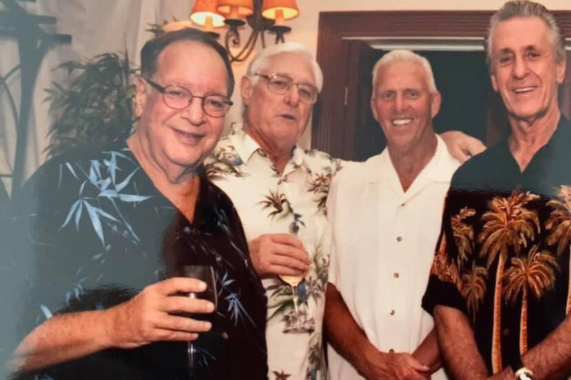 Hank Goldberg at a Hawaiian shirt party with, from left to right, former NFL quarterback Billy ...