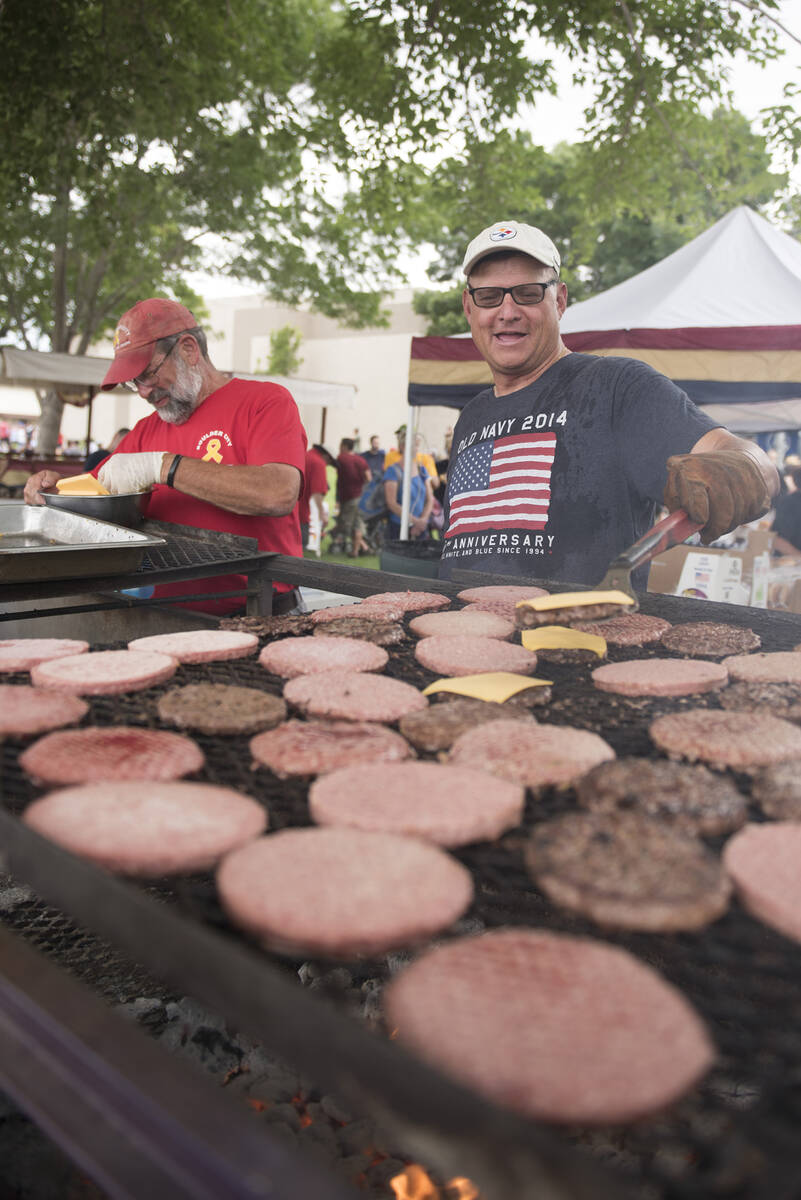 In this July 4, 2015, file photo, Tim Hauter, left, and Ken Morane, members of Elk's Lodge #168 ...