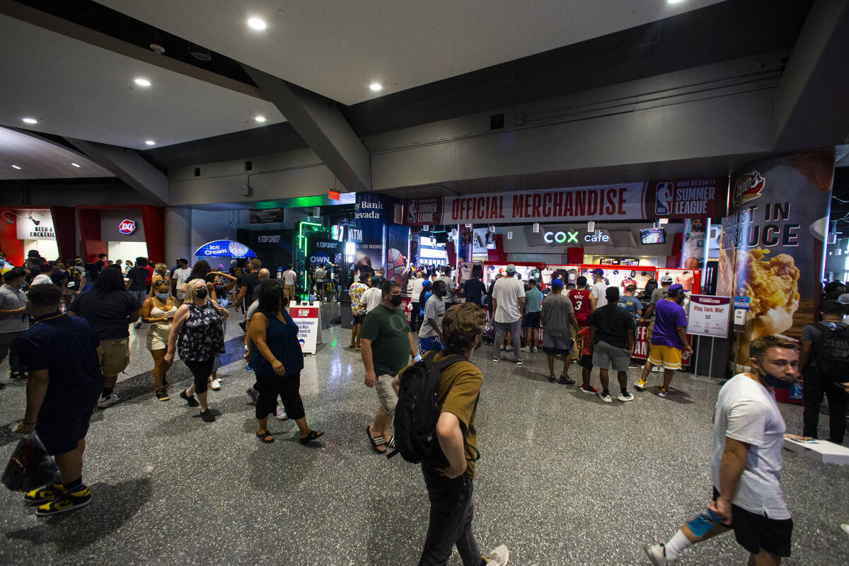 Basketball fans walk the concourse during the NBA Summer League at the Thomas & Mack Center ...