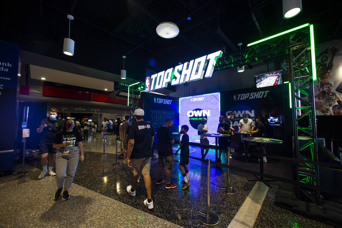 Basketball fans walk the concourse during the NBA Summer League at the Thomas & Mack Center ...