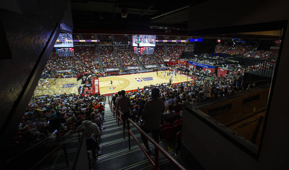 Basketball fans watch as the Detroit Pistons play the Oklahoma City Thunder during the first ha ...