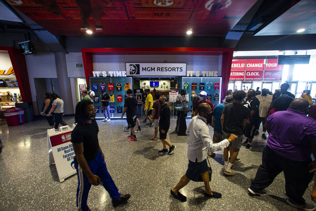 Basketball fans walk the concourse during the NBA Summer League at the Thomas & Mack Center ...