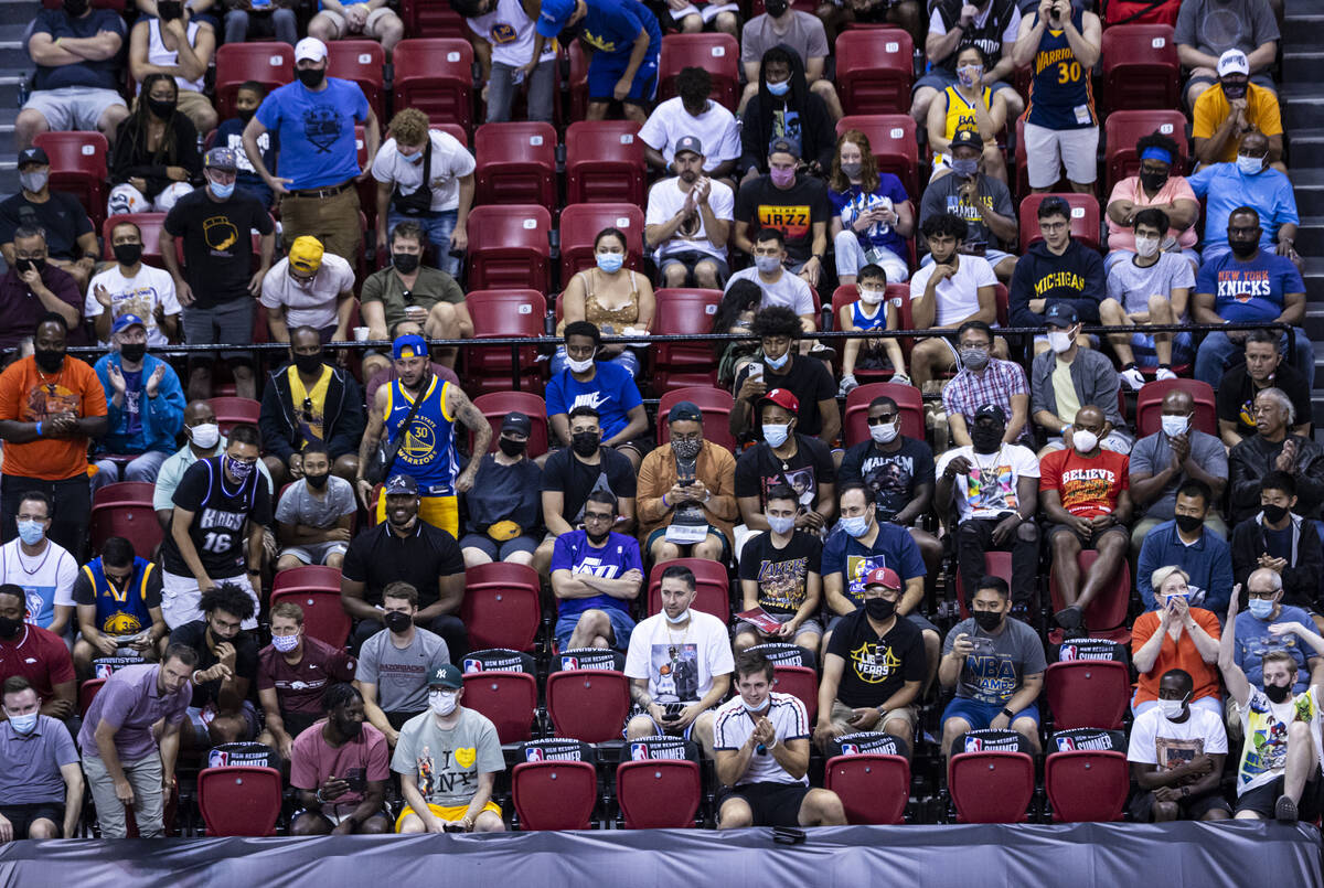 Basketball fans watch as Golden State plays Orlando during the first half of an NBA Summer Leag ...