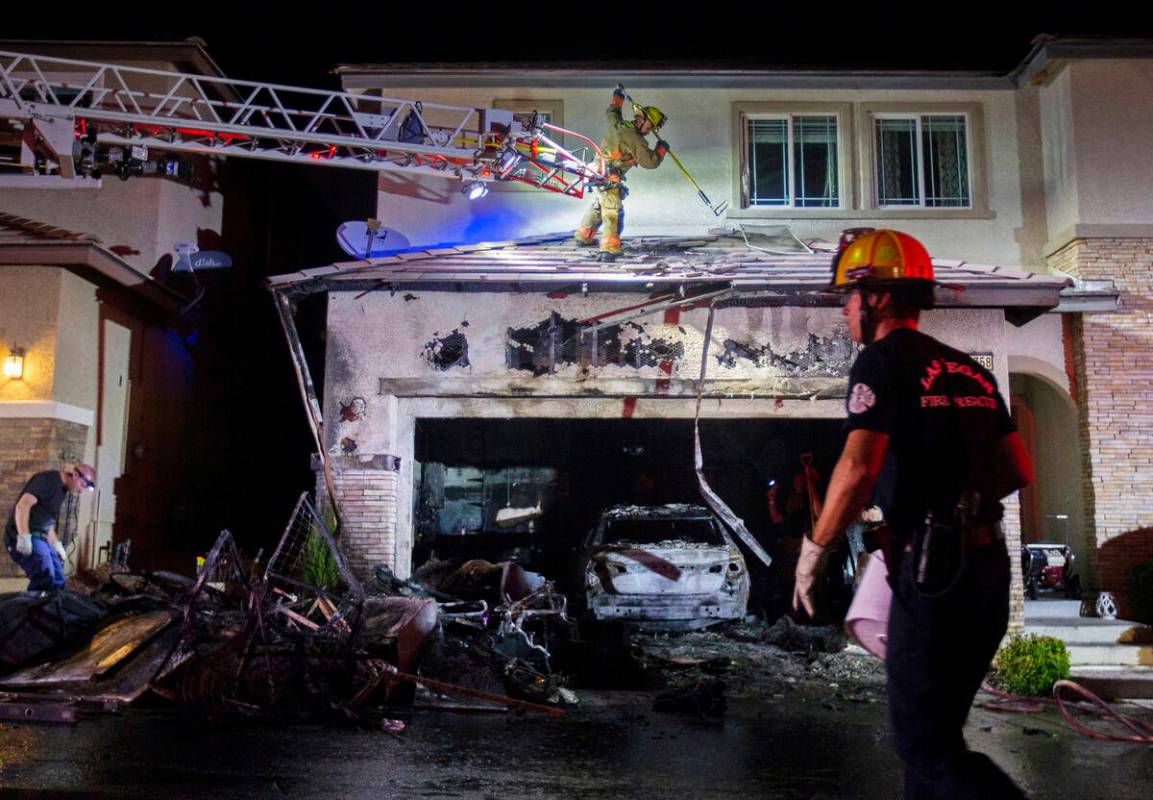 Fire fighters respond to a structure fire suspected to be caused by fireworks at 10758 Red Badg ...