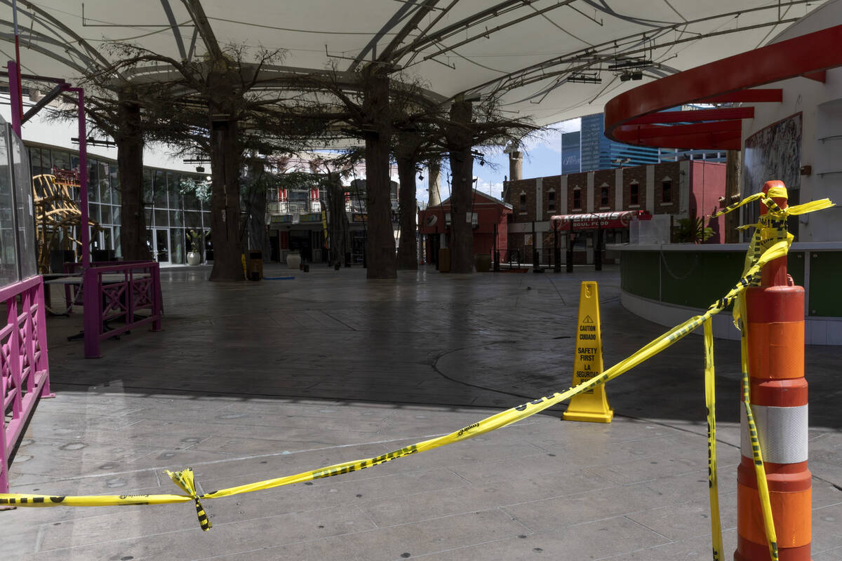 Caution tape outlines the closed Hawaiian Marketplace, Wednesday, June 29, 2022, on the Las Veg ...