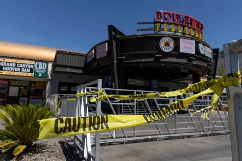 Caution tape marks the Boulevard Food Court, which is in Cable Center Shops, closed, Wednesday, ...