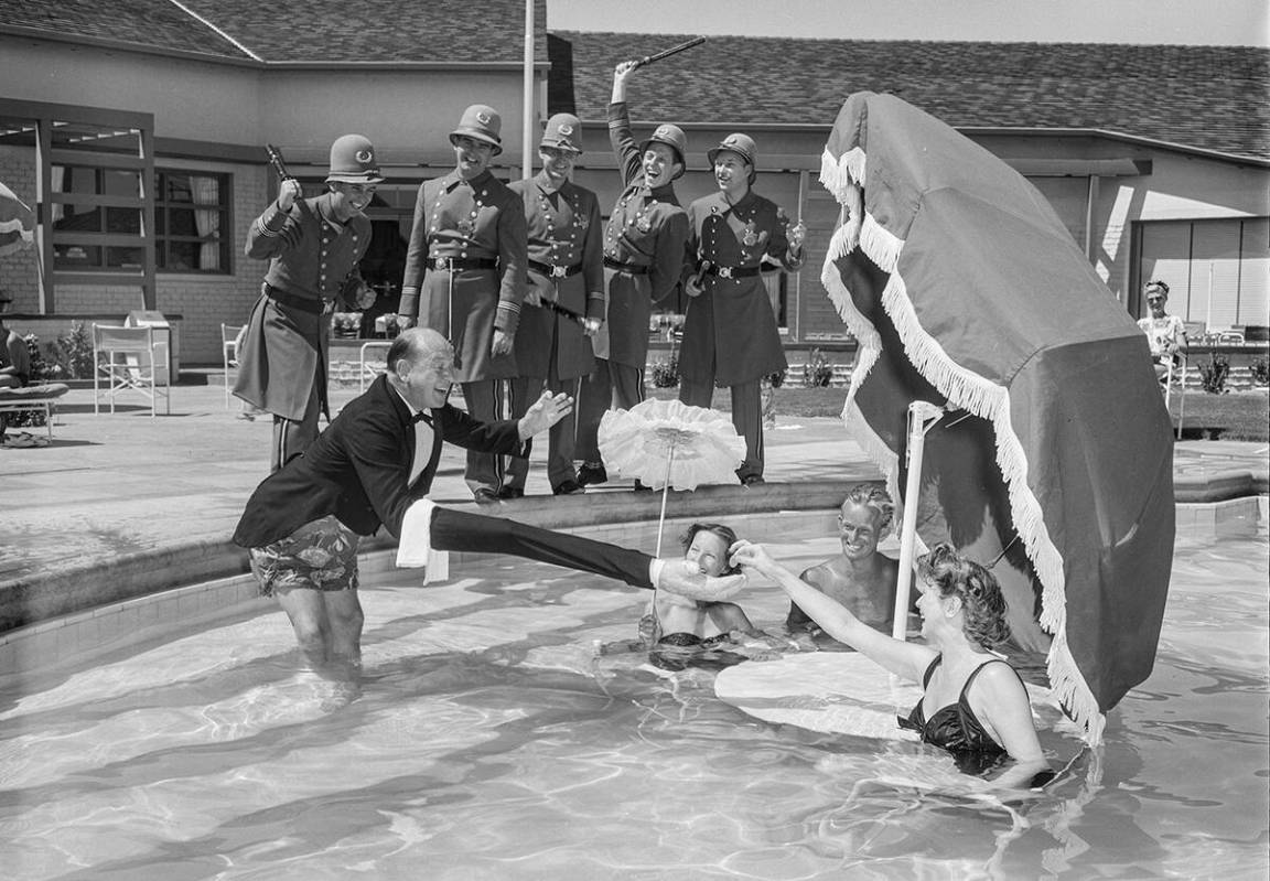 Frank Librise (butler) demonstrates how to keep cool and enjoy lunch during a photo shoot at th ...