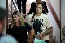 WNBA star and two-time Olympic gold medalist Brittney Griner is escorted to a courtroom for a h ...