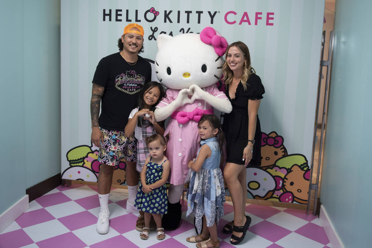 Fredric Robart, from left, Kennedi, 9, Isla, 2, and Logan, 4, and Katie Robart pose with Hello ...