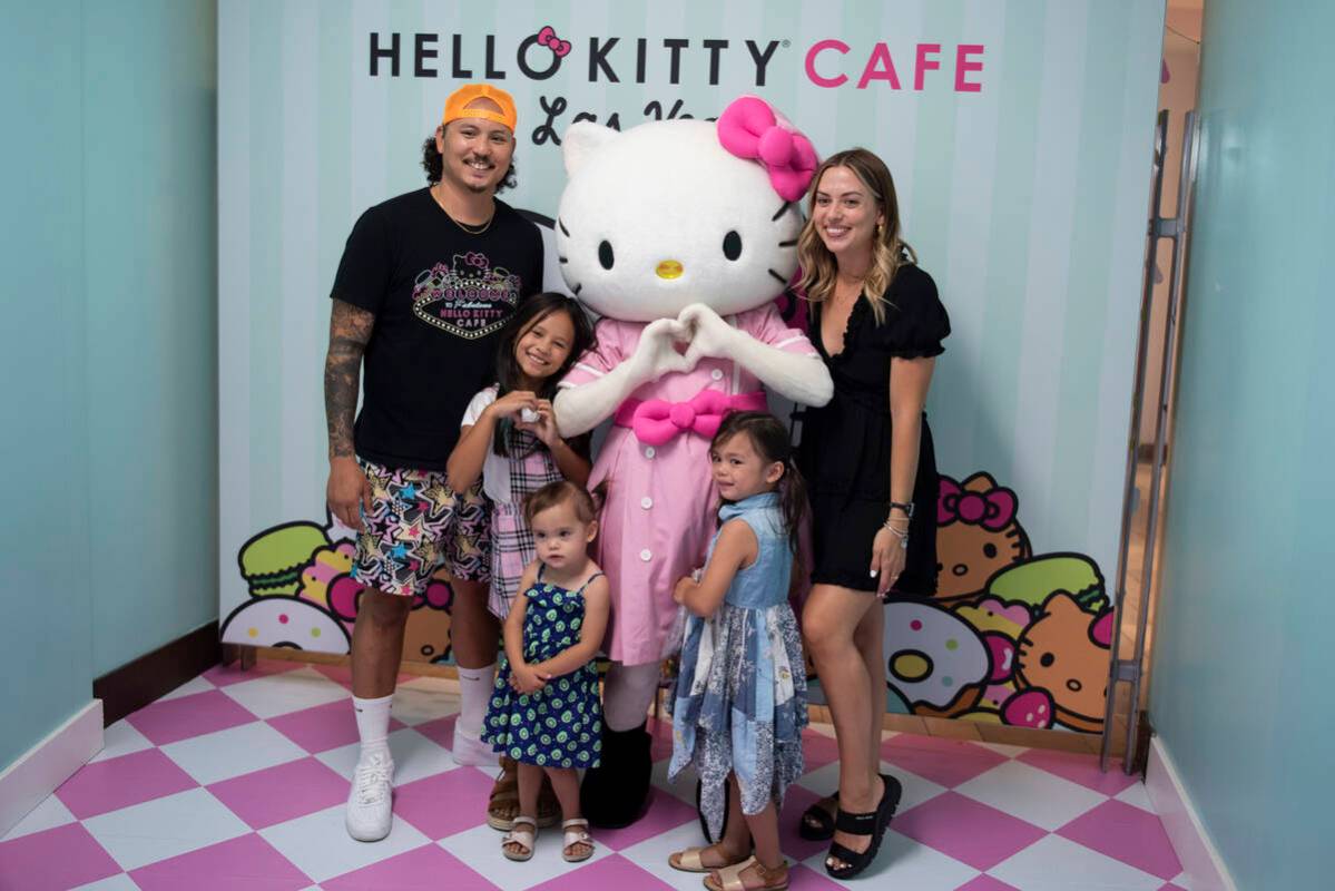 Fredric Robart, from left, Kennedi, 9, Isla, 2, and Logan, 4, and Katie Robart pose with Hello ...