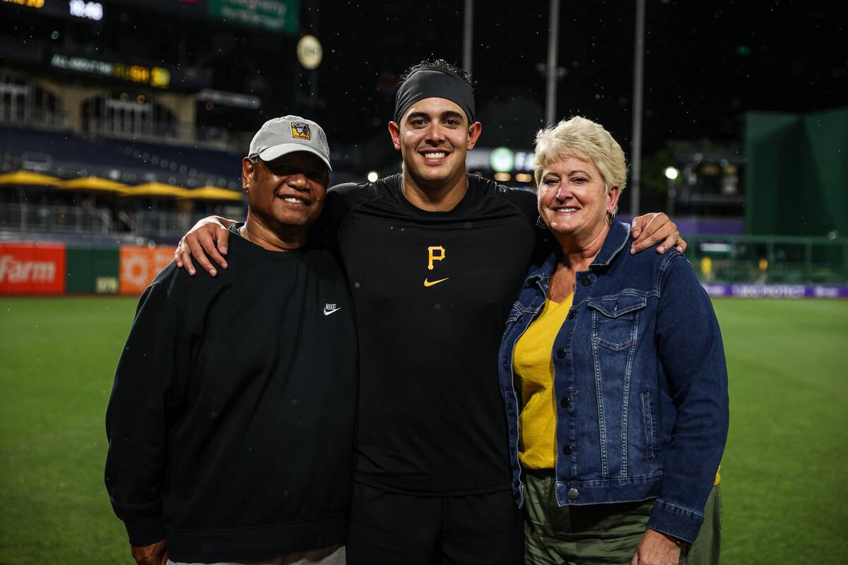 Foothill High product Bligh Madris, center, is flanked by his parents Style (left) and Kim afte ...